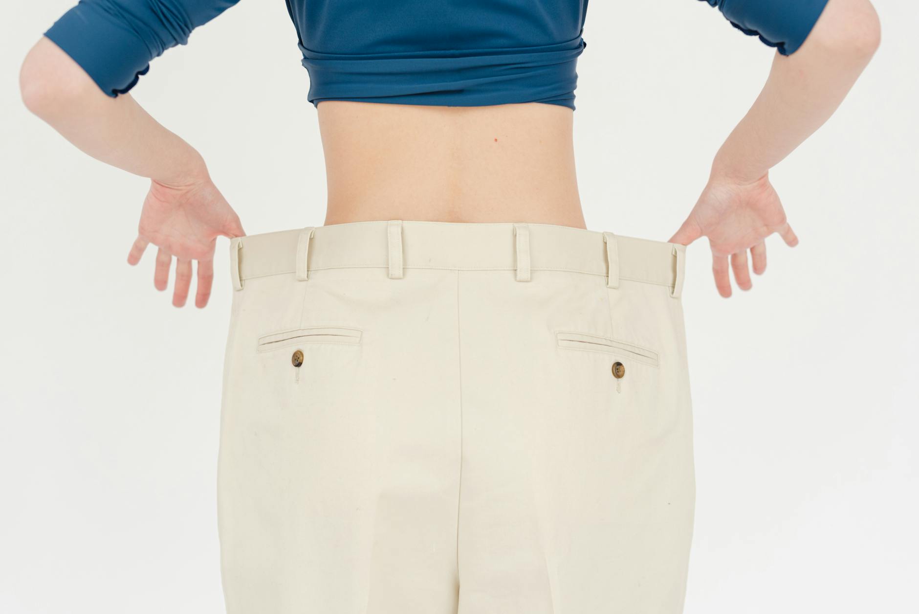 crop slender woman in oversized pants